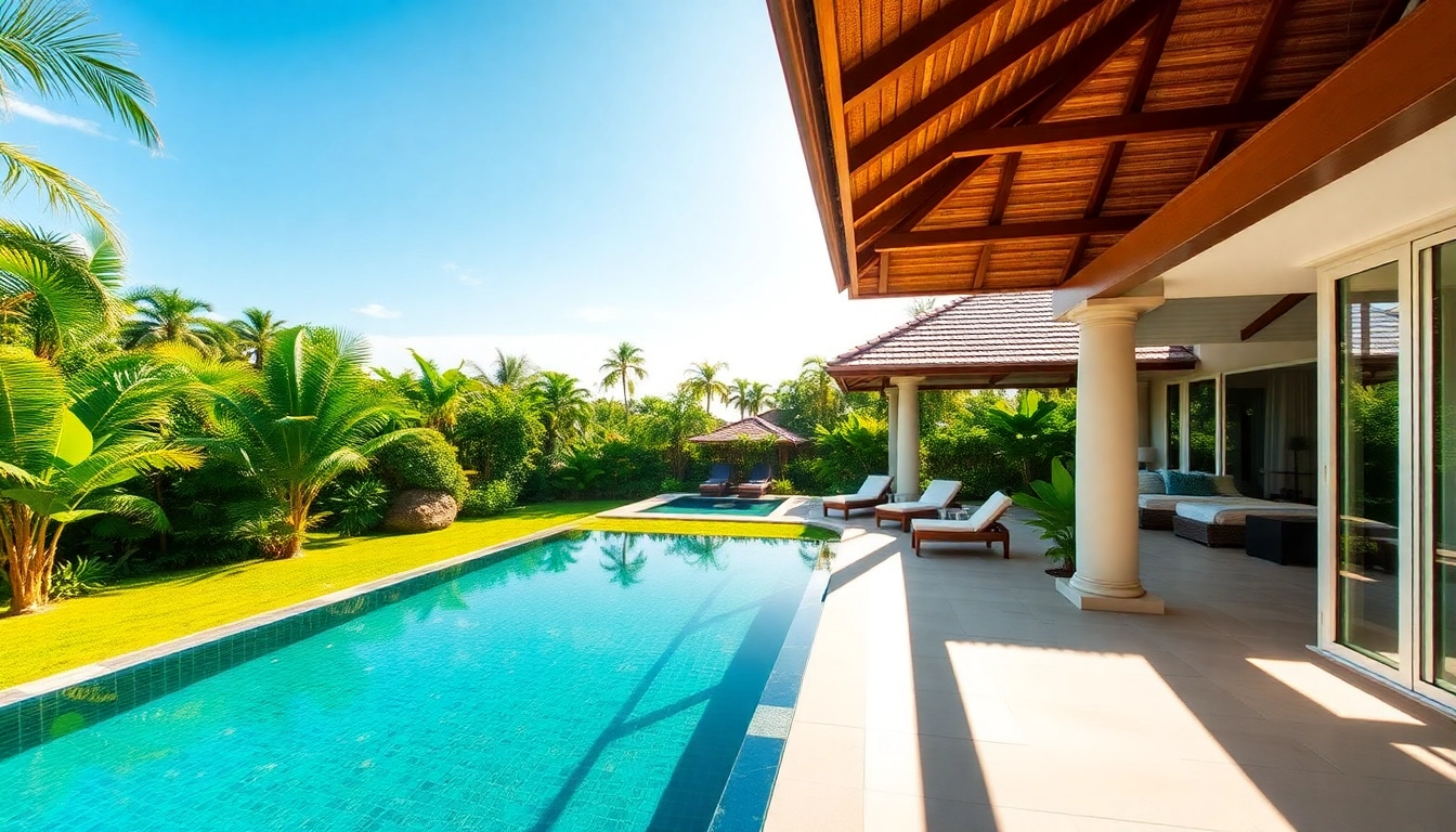 Phuket real estate agents showcasing a luxury villa with vibrant gardens and stunning views.